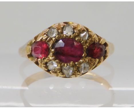 An 18ct gold ruby and diamond cluster ring Birmingham circa 1900, size H, weight 2gms Condition Report: Available upon reques