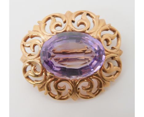 A 9ct gold amethyst set brooch, amethyst approx 18mm x 13mm, weight 9gms Condition Report: Available upon request