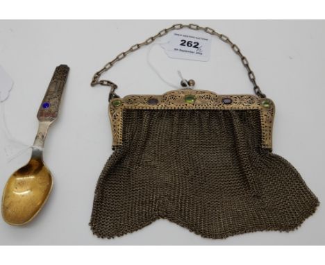 A lot comprising a metal mesh purse with gilt metal clasp set with glass gemstones and a 925 silver and enamel spoon (2) Cond