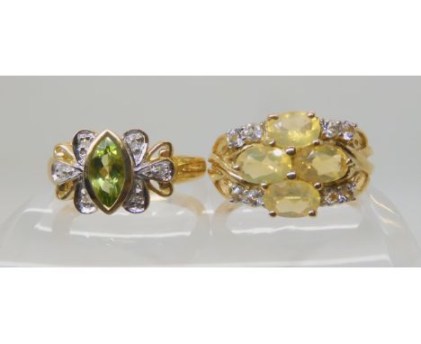 A 9ct gold marquis cut peridot and diamond ring size N1/2, and a 9ct fire opal and white topaz ring size N1/2. combined weigh