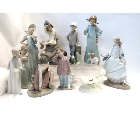 A Royal Worcester salt modelled as a merboy, and nine assorted Lladro and Nao figures Condition Report: Three figures are bro