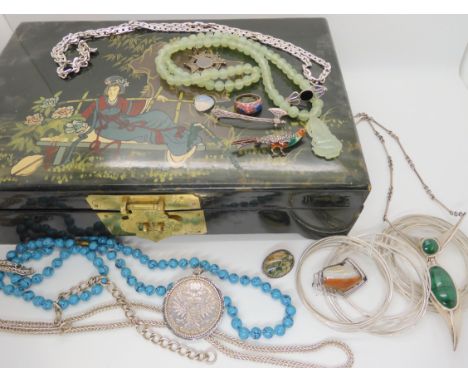 An Oriental lacquer box a silver and malachite necklace, a silver 1780 Maria Theresia coin in pendant mount, a silver marcazi