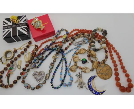 Two butler &amp; Wilson brooches, vintage costume to include a parrot brooch, millifiori beads etc Condition Report: No condi
