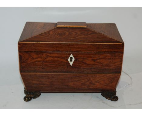A sarcophagus-shaped two-division tea caddy with brass handles and feet, 20cm wide and another lacking interior, 27cm wide (2