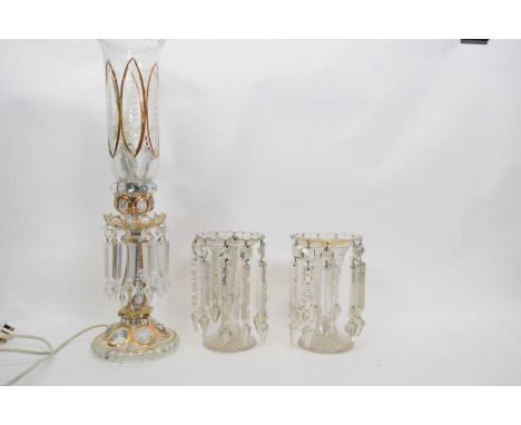 Pair of table lustres of plain glass, together with a further table lustre converted to a lamp, with gilt and white painted d