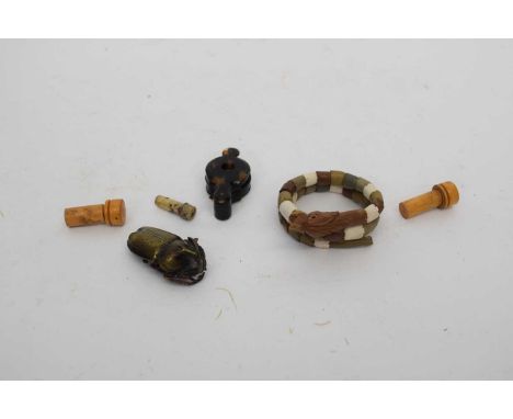 Small bag containing a number of wooden treen items, carved bracelet, small model bellows, metal model of a scarab etc (qty)