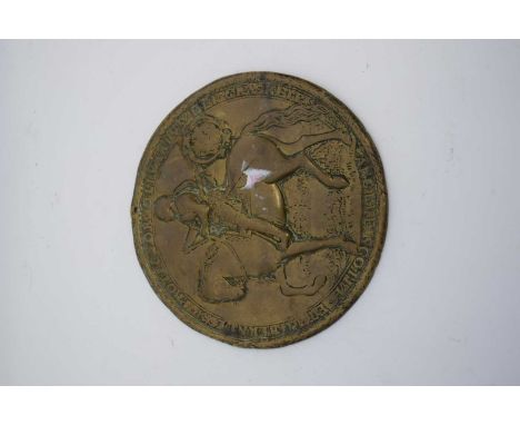 Brass plaque with model of Oliver Cromwell on horseback with Latin inscription to border