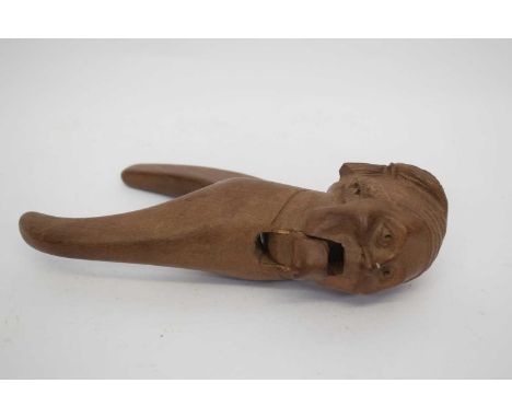 Late 19th century figural wooden nutcracker carved as a French peasant