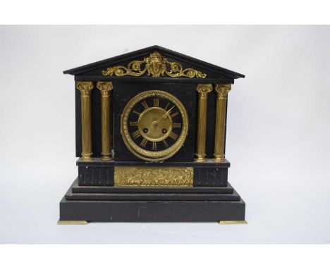 Late Victorian black slate cased mantel clock, the dial with Roman numerals to a twin train movement striking on a coiled gon
