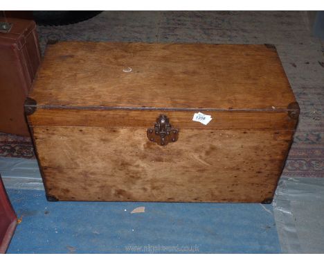A small wooden trunk, 61 x 33 x 28.5 cm.