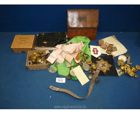 A quantity of militaria to include WWII defence medal, WWII War medal, cloak chain, a notebook belonging to a W.B. Clegg C.P.