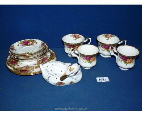 A quantity of Royal Albert 'Old Country Roses' including, two cups and saucers, two mugs and saucers, 2 side plates and two s