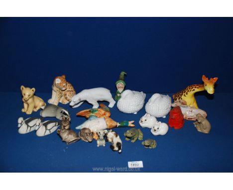 A quantity of animal and bird ornaments including Beswick flying Mallard, Poole mice,USSR rabbits and badger, giraffe, lion c