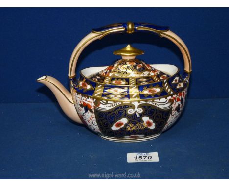 An unusual 19th Century Davenport Imari Teapot of 'kettle' form with overhead handle, 6 1/2'' tall.