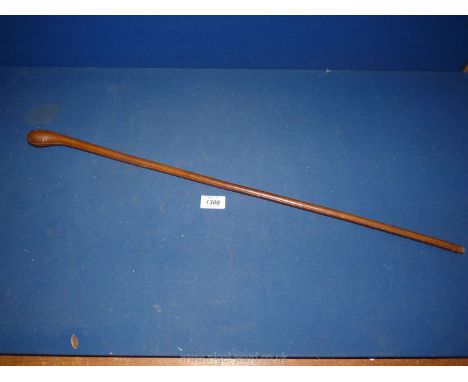 A neatly stitched leather bound swagger stick 27 7/8" long.