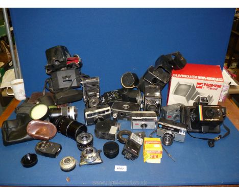 A quantity of cameras to include, Polaroid Land camera, Pronto folding camera, Kodak Six-20 Brownie, Kodak Instamatic cameras