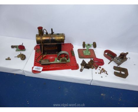A Mamod model living steam stationary Engine having a single oscillating cylinder, the flywheel 2 3/16" diameter approx. the 