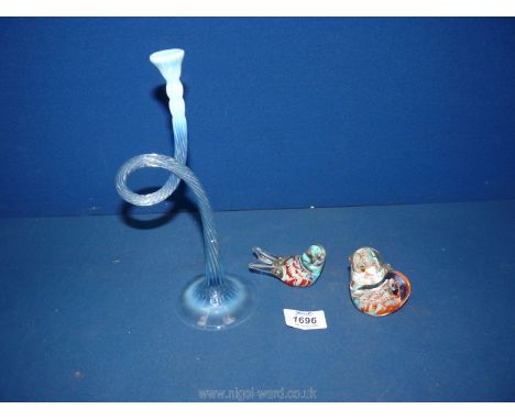 Two bird paperweights and a blue bugle 