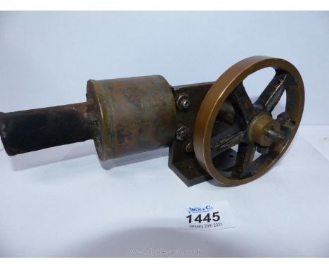 A horizontal cylinder Hot Air/Sterling cycle stationary Engine, the six spoke fly wheel 3 3/4'' diameter approx., 8 1/4'' lon