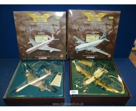 Two 1:144 scale model Corgi airplanes: D.M Comet 4 Dan-Air London and Boeing 377 Stratocruiser of BOAC.