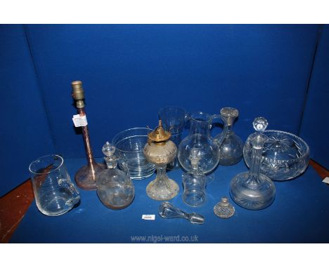 Mixed glassware to include three decanters, cut glass trifle bowl, pair of small bowls, jugs, glass oil lamp etc.