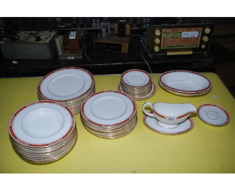 A Royal Worcester 'Beaufort', 12 setting dinner service including large plates, side plates, soup bowls, sauce boat and sauce