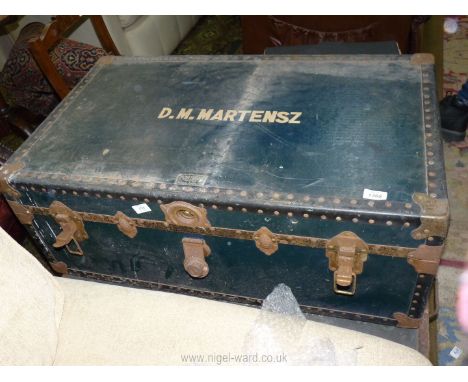 A Victor Luggage travel trunk having interior shelf, "D.M. Martensz" to lid, 35 1/2" x 21" x 13 1/2".