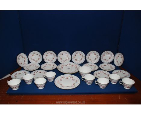 A Royal Crown Derby ''Melrose'' part Teaset comprising eight cups and saucers, cake plate, etc. some a/f