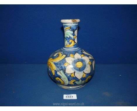 A Maiolica ceramic pot bellied Vase with bold blue and yellow floral pattern, inscribed to base A 13/63, with Trollope &amp; 