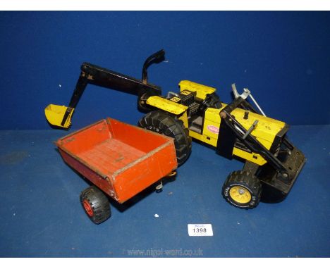A yellow Tonka toy tractor with digger buckets and a Meccano red trailer.