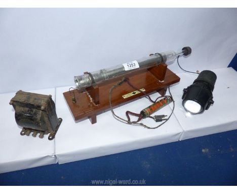 A boxed satinwood mounted glass laboratory Tube with electrical connections and labelled "W &amp; J George Ltd. Birmingham F.