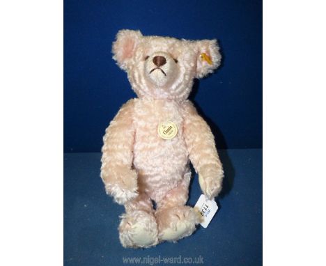 A pink Steiff Classic jointed Teddy Bear 'Knopf IM OHR', with button and growler, no 000270, 13 1/2'' tall.