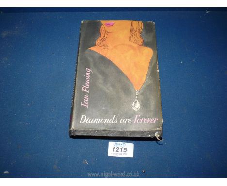 A first edition copy of 'Diamonds are Forever', published in 1956 by Jonathan Cape.  The dust jacket is worn and torn and sta