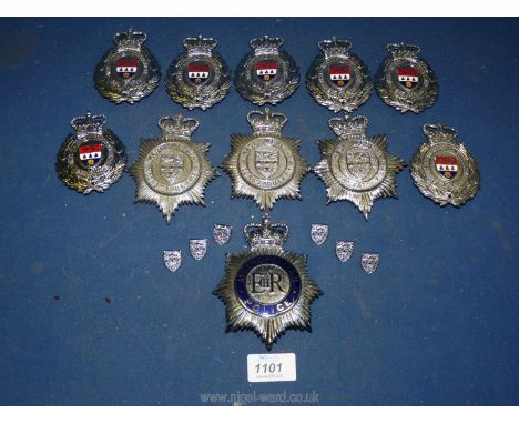 A quantity of West Mercia helmet plates, some having enamel centres.