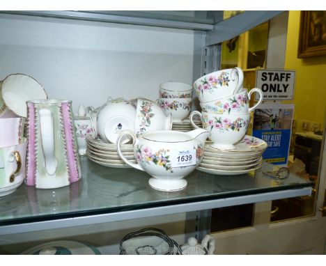 A Wedgwood 'Downland' part Teaset including nine cups, 12 saucers, cake and tea plates, milk jug, slop bowl, sucrier etc.