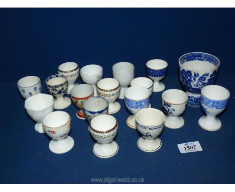 A quantity of egg cups including Adams, Royal Worcester, Coalport etc.