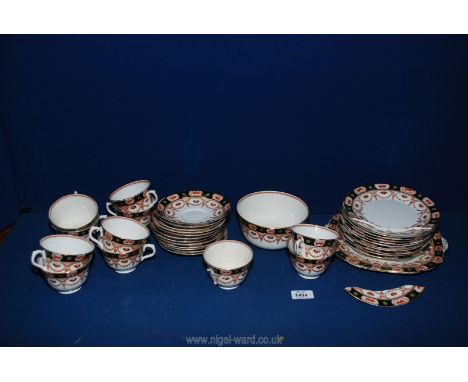 A vintage Thames part tea service in blue and amber panel border decoration with garlands and swags of flowers, side plates, 