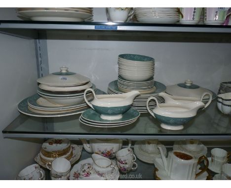 A Royal Doulton 'Cascade ' part dinner service including sauce boats and stands, meat, dinner and tea plates, lidded serving 