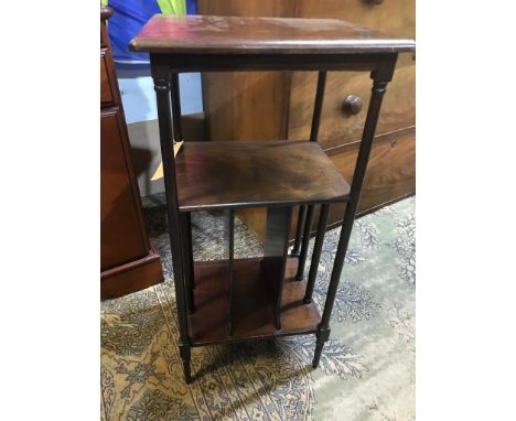 An attractive Mahogany Etagere/side Table having turned legs/supports and a lower shelf with a divided storage recess below s