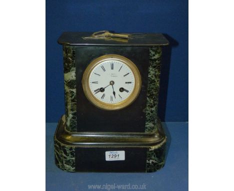 A heavy black slate Mantle Clock with marble inlay, with key, 10'' x 10'' x 5 1/2''.