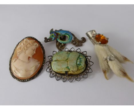 A Miscellaneous Collection of Brooches, including silver metal scarab, marcasite shell cameo, rabbits claw and enamel and sil