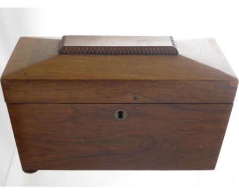 A Georgian Mahogany Tea Caddy in the form of a casket on bun feet, together with a mahogany writing slope. (2)