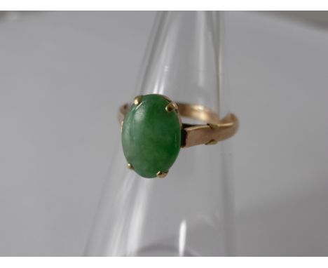 A Lady's 14k Yellow Gold Jade Ring, size O, approx wt 2.9 gms.