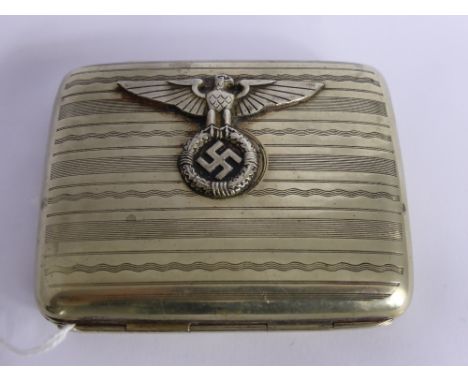 A WWII Silver Metal German Cigarette Case, engine turned with inscription which reads 'Eitel Shultze Bulach Deimling', raised