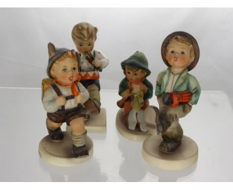 Four Miscellaneous Hummel Figures, including Young Boy and Bird 63, Boy with Umbrella 109/0, Boy with Drum and Boy with Rucks