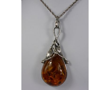 A Lady's Amber and Silver Pendant, in the form of a pear, approx 18 gms together with an enamel brooch in the form of a song 