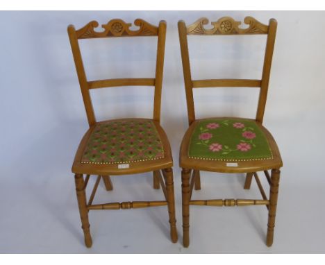 Two Oak Edwardian Bedroom Chairs, decorated chair backs, turned legs and stretchers. Tapestry seats depicting pink roses and 