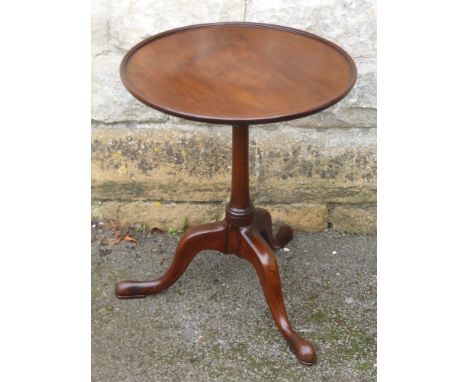 An Antique Mahogany Wine Table, tripod base, turned column and hoof feet, approx 45 x 55 cms.