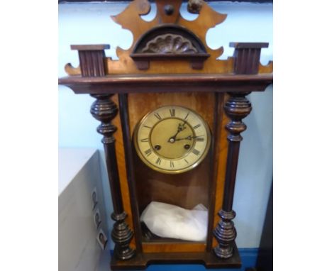 A Virana Mahogany Cased Wall Clock, with enamel and brass face and Roman dial, approx 64 x 30 cms