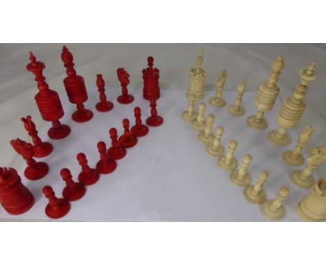 A Victorian Turned and Stained Antique Bone Chess Set, comprising of thirty two pieces in original blue velvet lined box, Kin